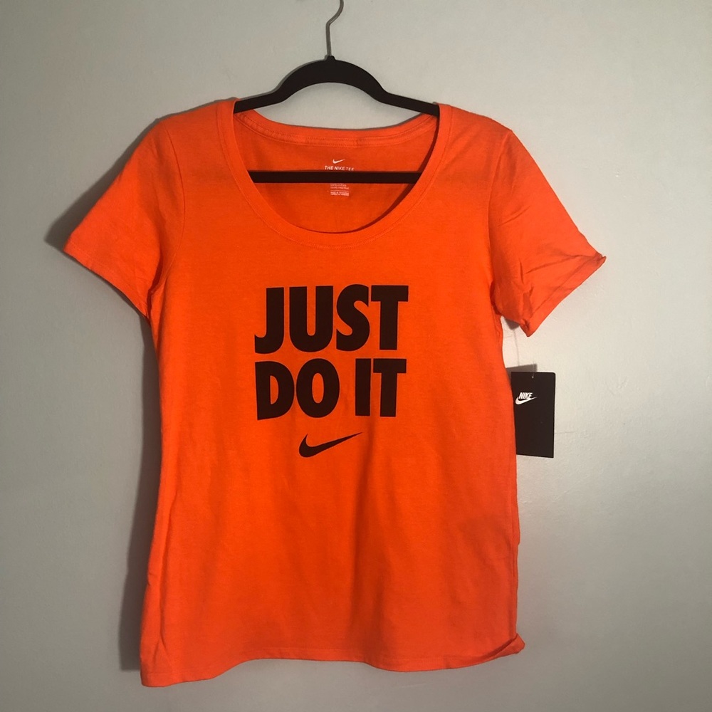 Nike orange t-shirt with black lettering